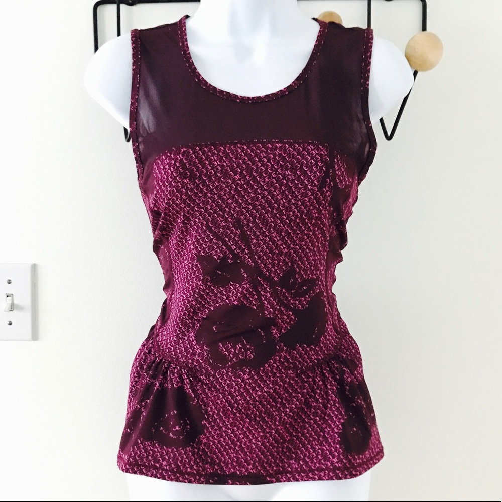 Sweet sleeveless mesh and peplum workout top